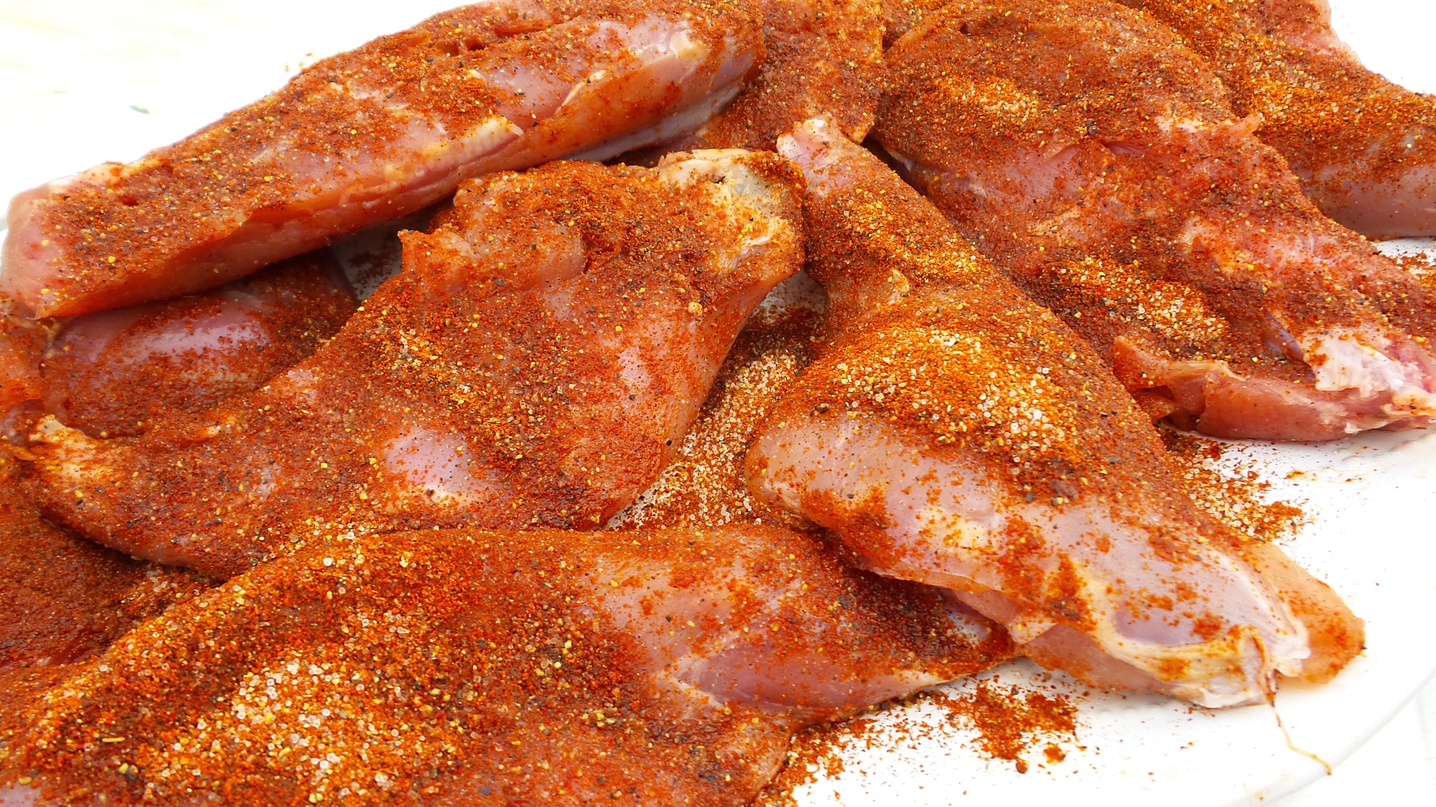 Season the rabbit with the rub and let it rest in the refrigerator for 1-2 hours.