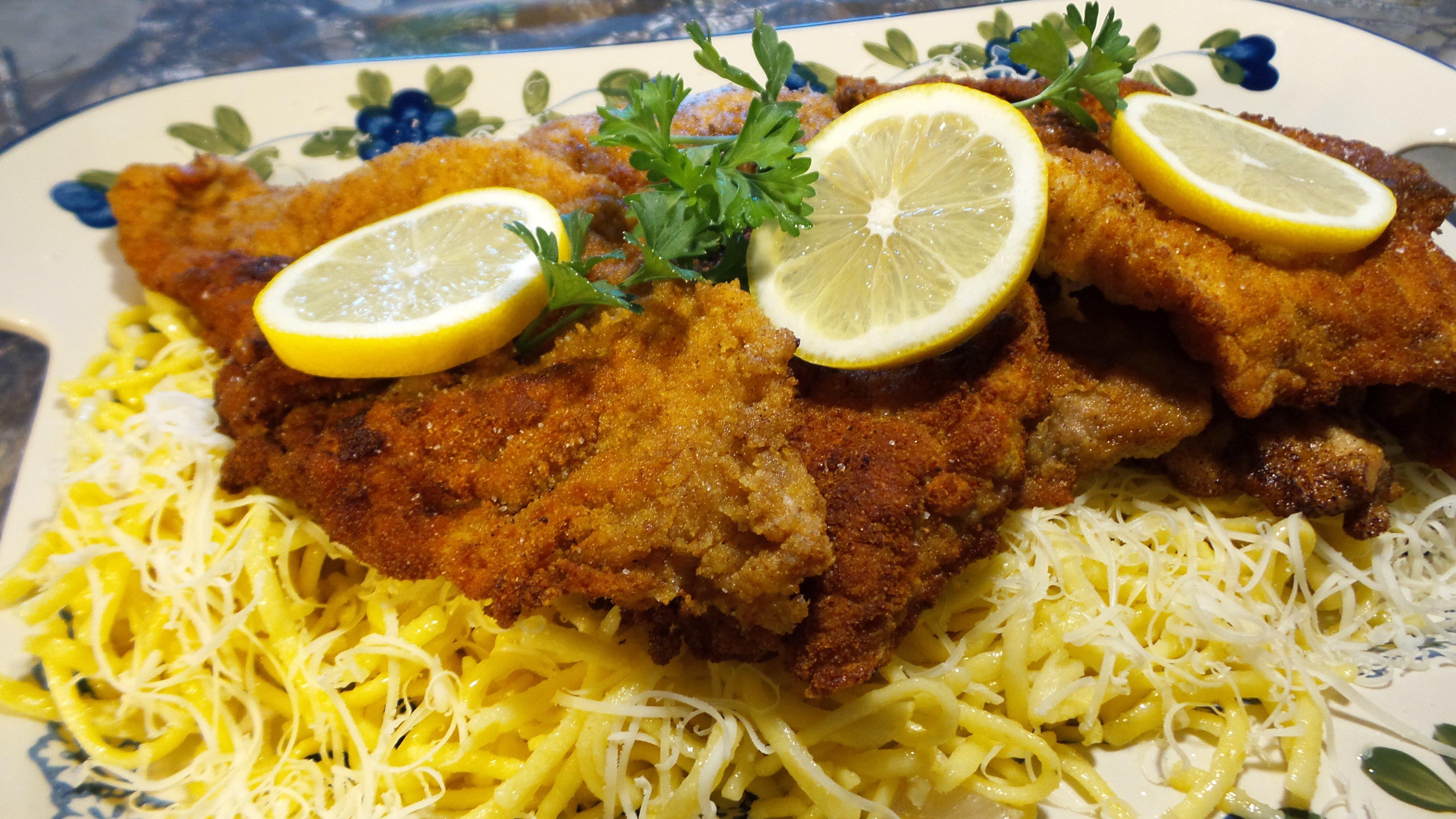 Serve the schnitzel with spaetzle noodles.