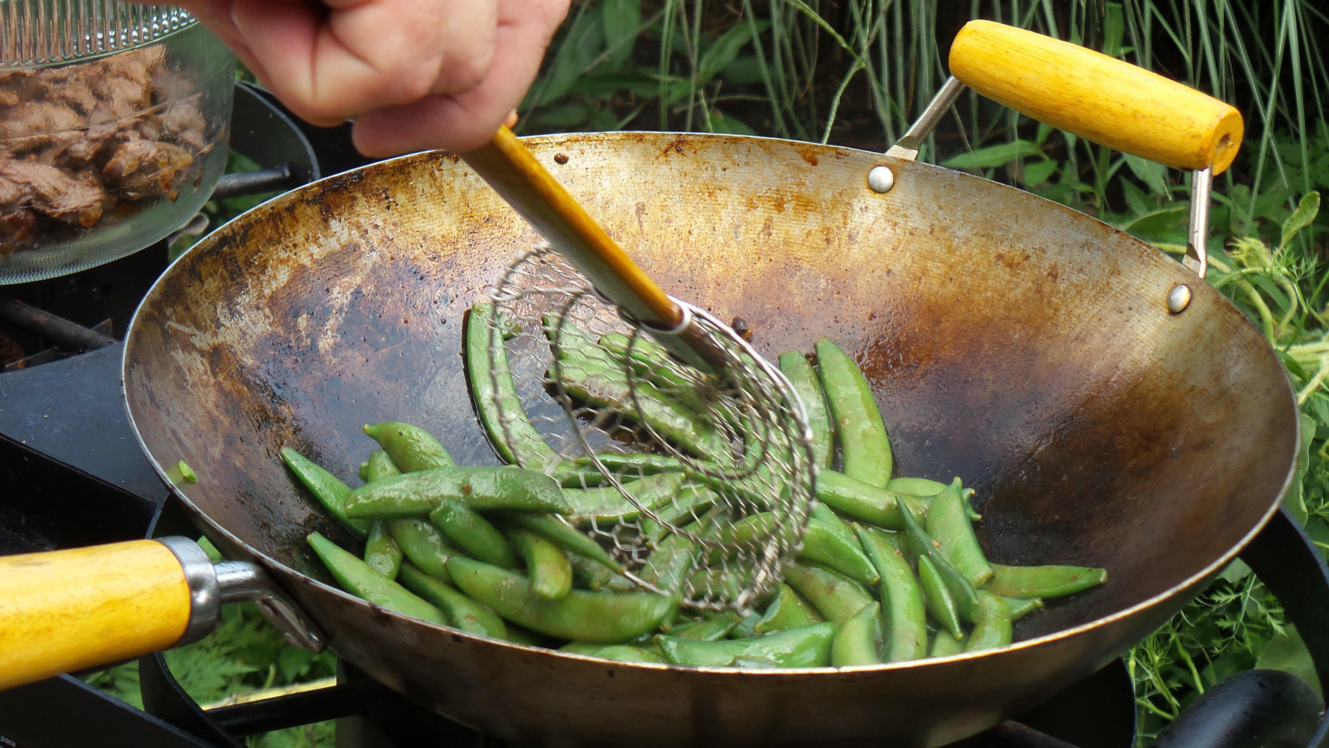 Stir fry the peas until they are just done, but still crisp.