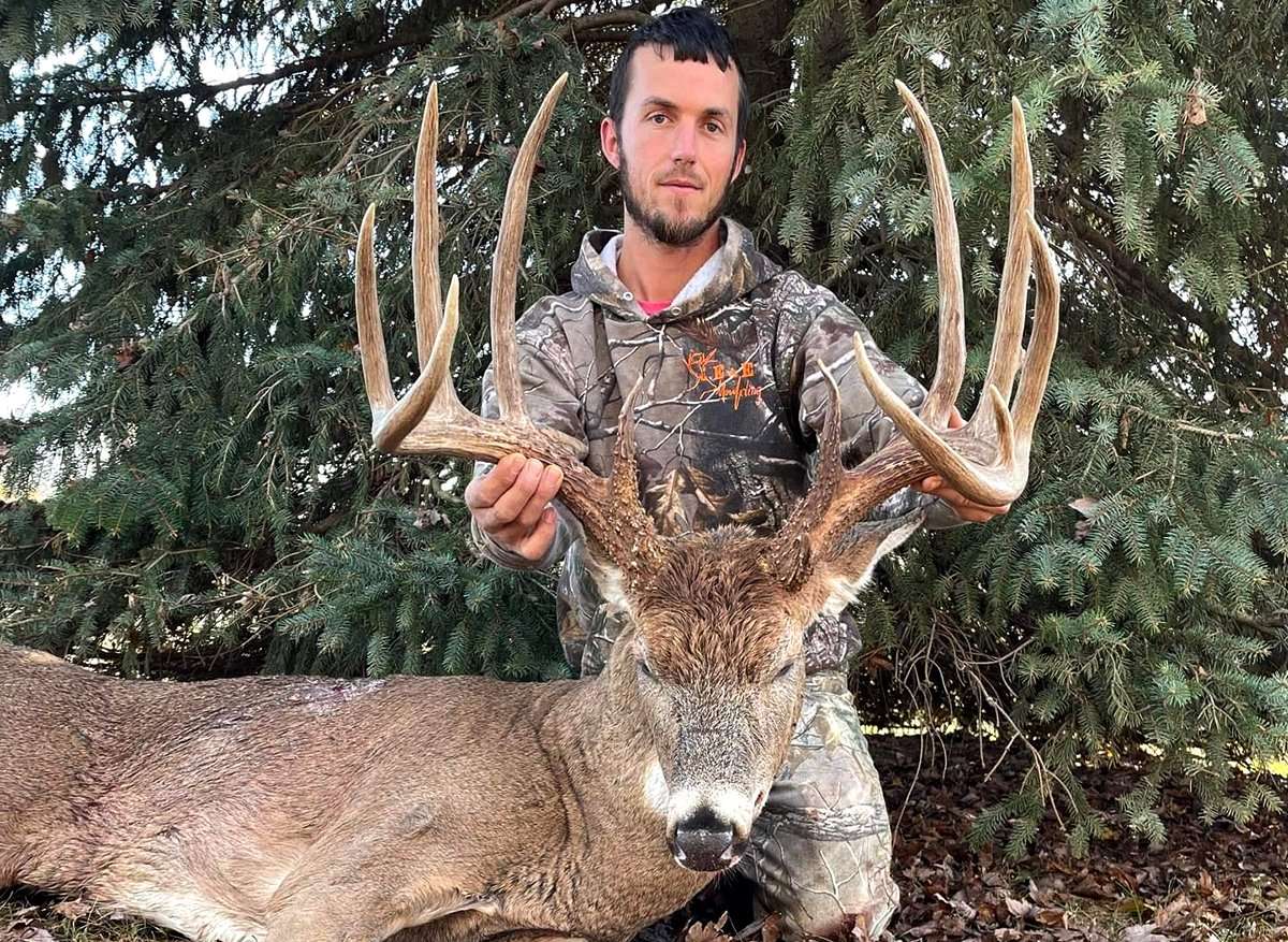 Indiana bowhunter Emanuel Stoll shot this impressive buck in a funnel less than two weeks after catching the monster on his trail camera. Image courtesy of Emanuel Stoll