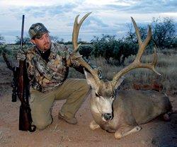 Tim Herald with a beautiful mule deer. (Tim Herald photo)