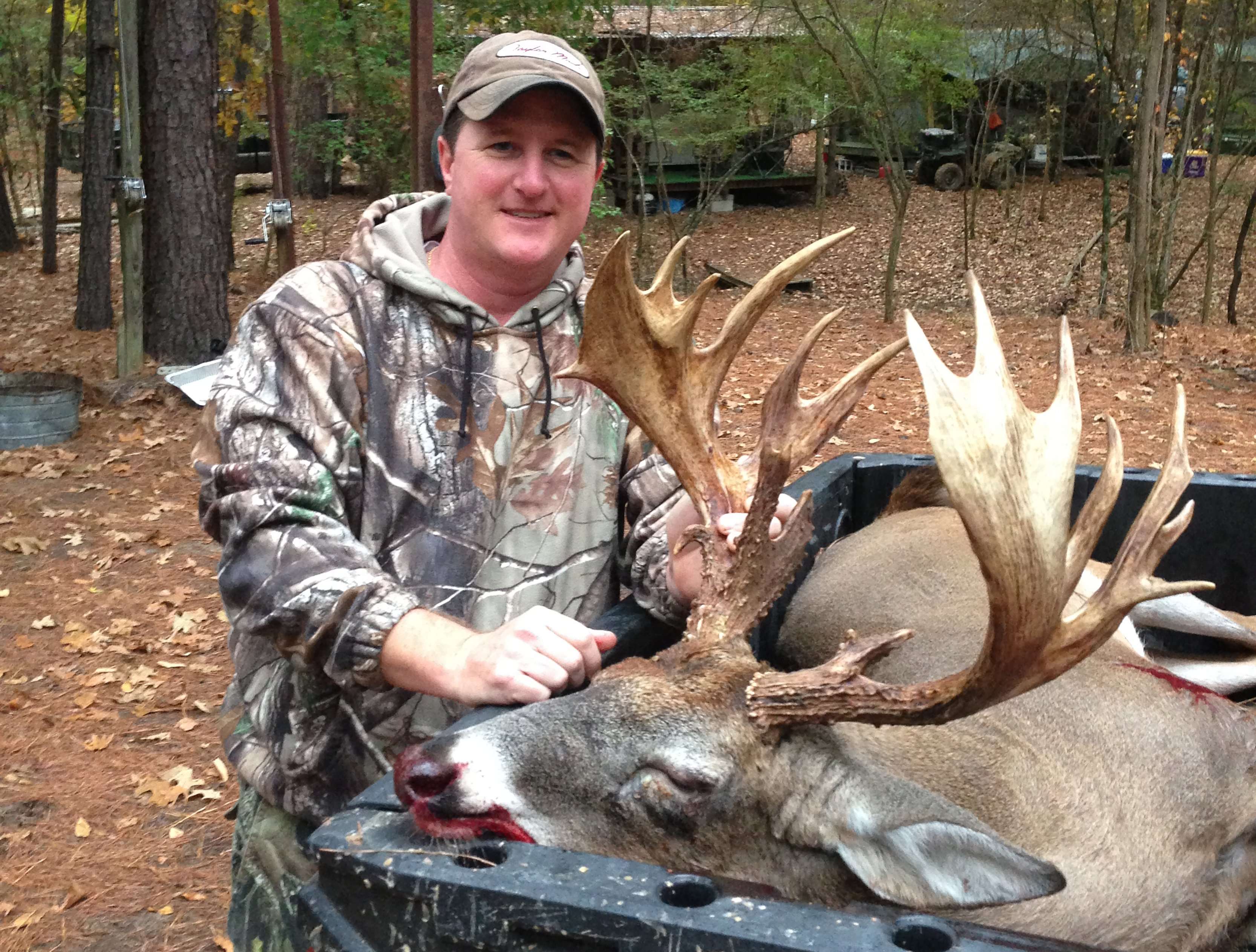 Clay Toms with his massive Arkansas whitetail. 