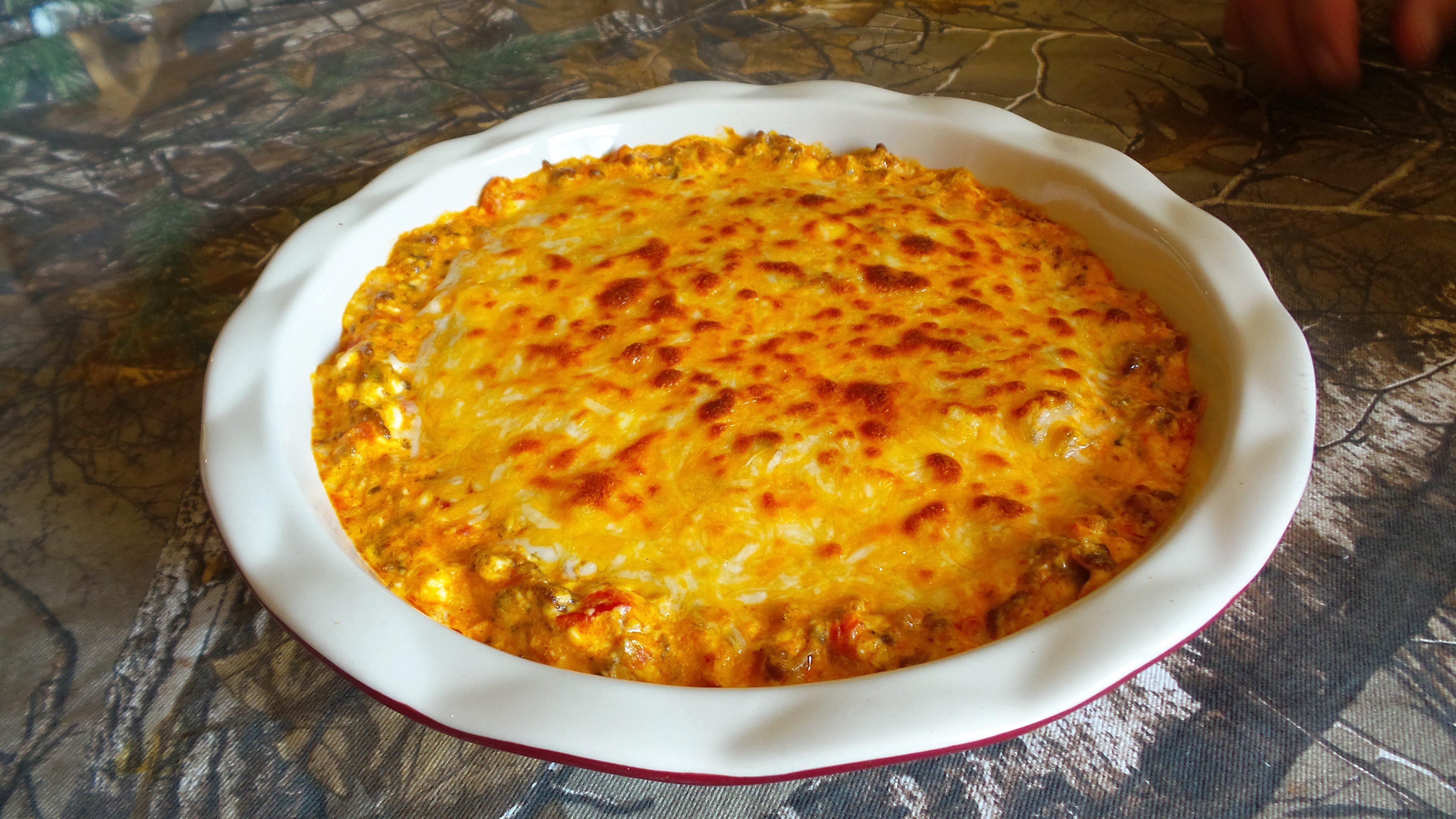 Top the mixture with shredded cheese and bake till the cheese is warm and bubbly.