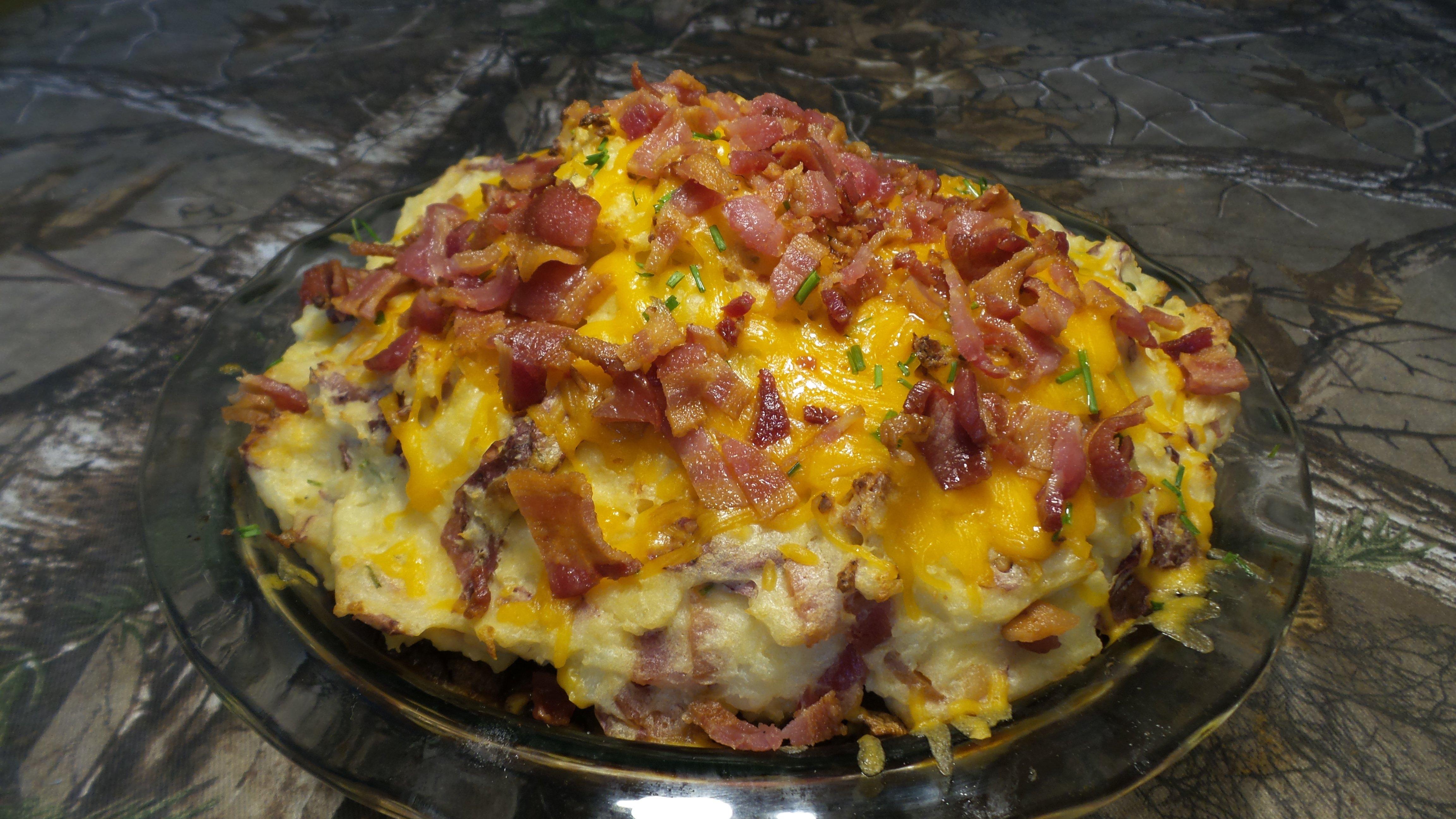 Bake the Shepherd's Pie to brown the potatoes and melt the cheese.