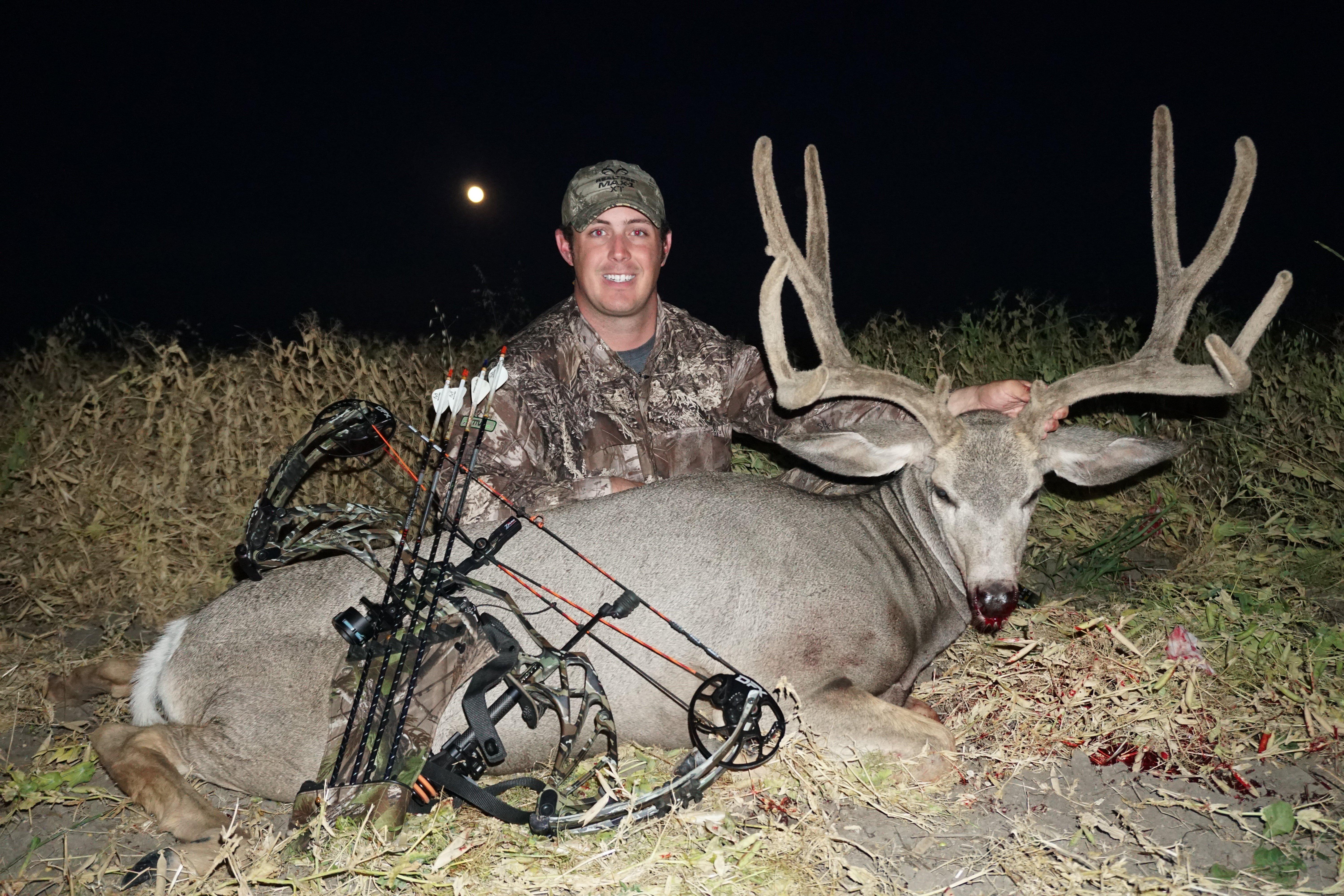 Tyler Jordan with his Alberta velvet muley. 