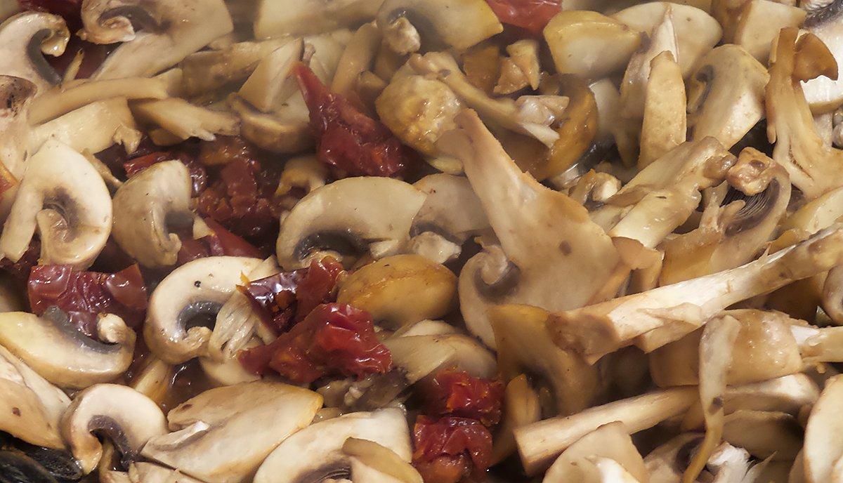 Saute the mushrooms, tomatoes, garlic and herbs in butter before adding cream.