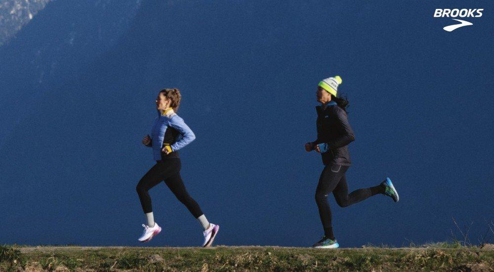 two people running outside