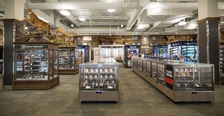 Image is rows of firearms and firearm accessories. 