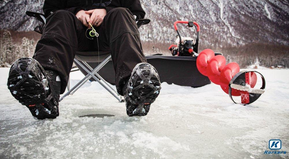 a man wearing a pair of ice fishing boots when on the ice