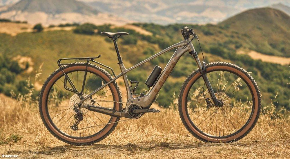 an electric bike on the side of a trail