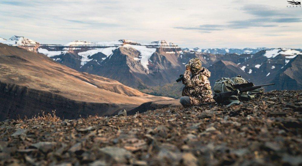 a hunter wearing the big game layering system on a hunt