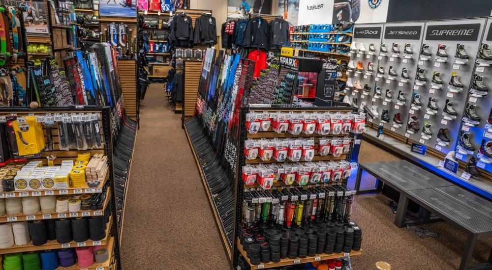 A variety of hockey gear and accessories on display at SCHEELS.