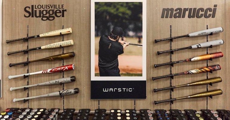 baseball and softball bat display at a SCHEELS store location
