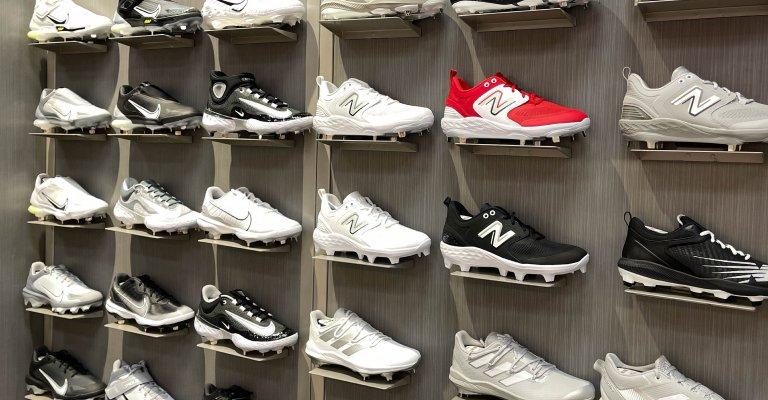 baseball and softball cleat display at a SCHEELS store location