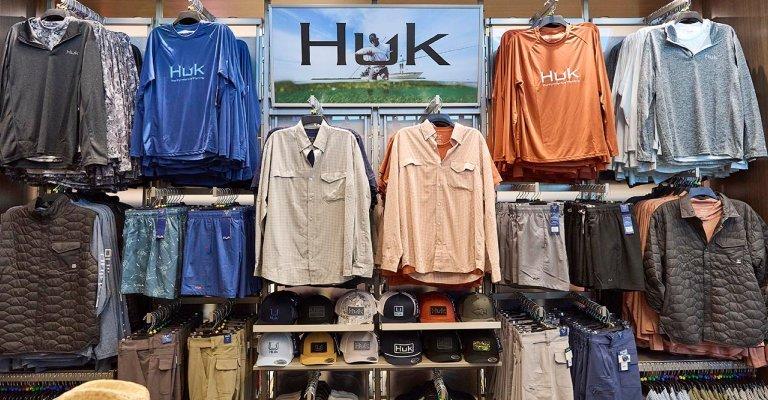 fishing clothing display at a SCHEELS store location