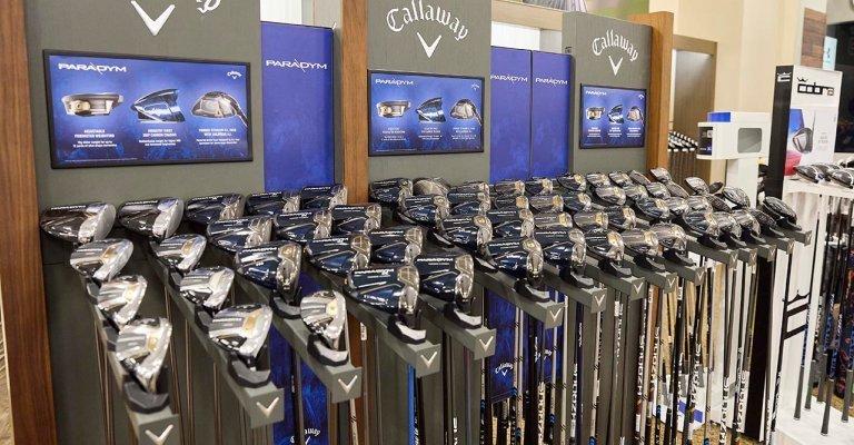 golf club display at a SCHEELS store location