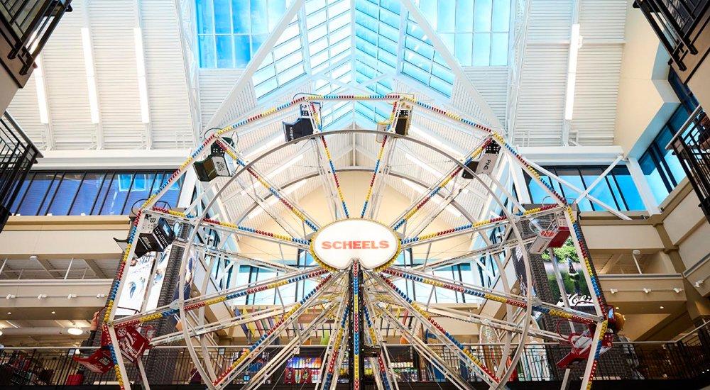 a Ferris wheel at a SCHEELS location