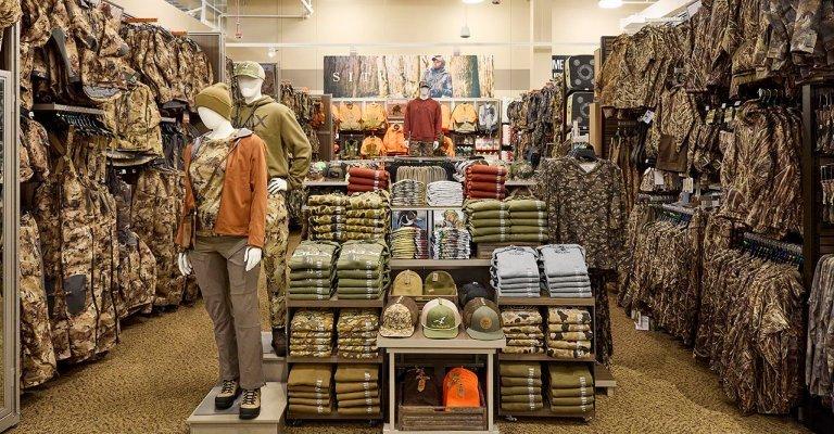 hunting clothing display at a SCHEELS store location