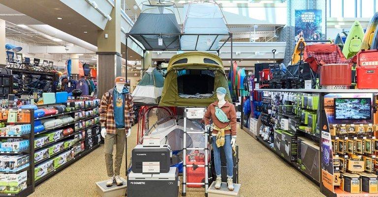 the camping shop at a SCHEELS showing the wide selection