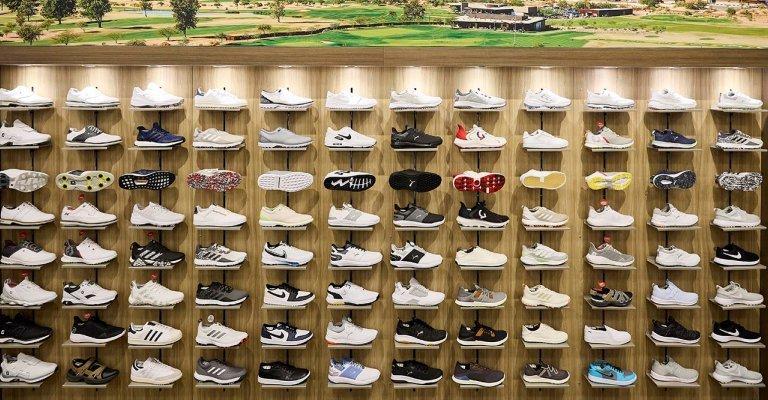 golf shoes display at a SCHEELS store location