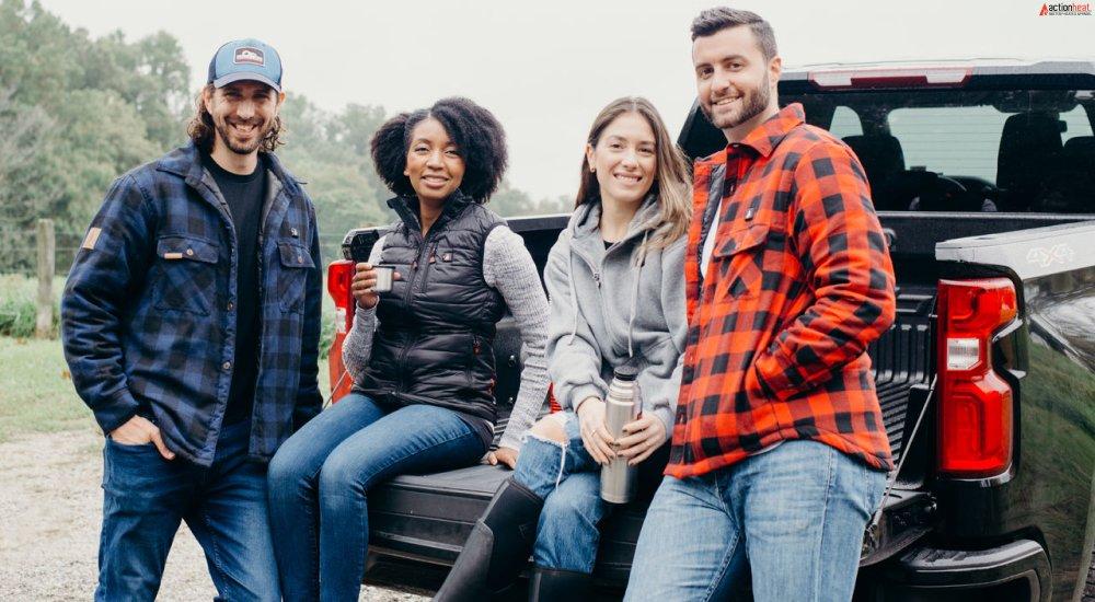 a group of people wearing heated clothing outdoors at a tailgate