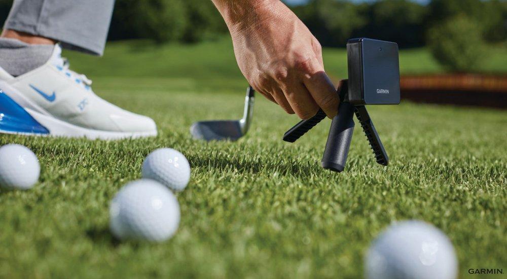 a garmin golf launch monitor at the driving range