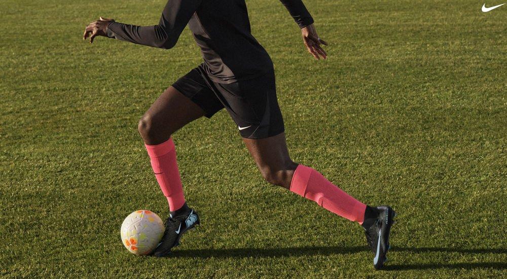 a player wearing a pair of soccer shin guards while playing a game