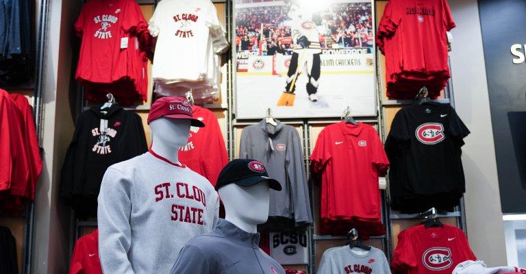 A variety of St. Cloud State Huskies fan gear on display.