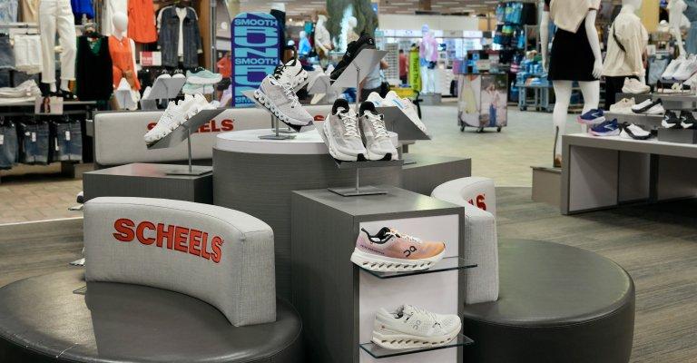 a selection of women's shoes on display at st. cloud scheels