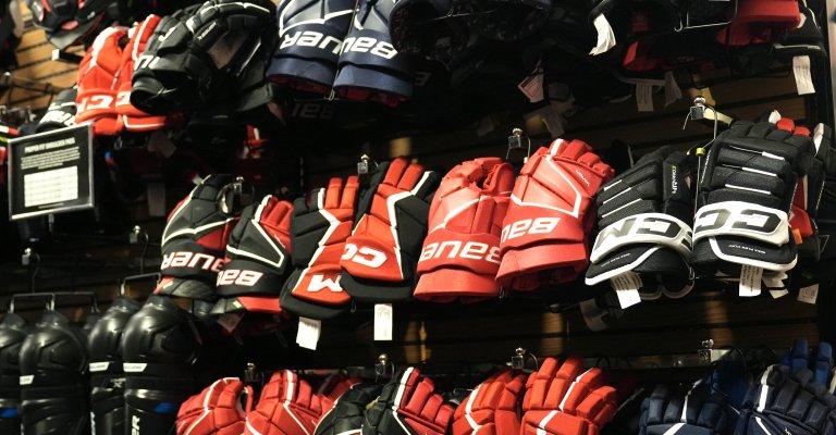 a selection of hockey gloves on display at st cloud scheels