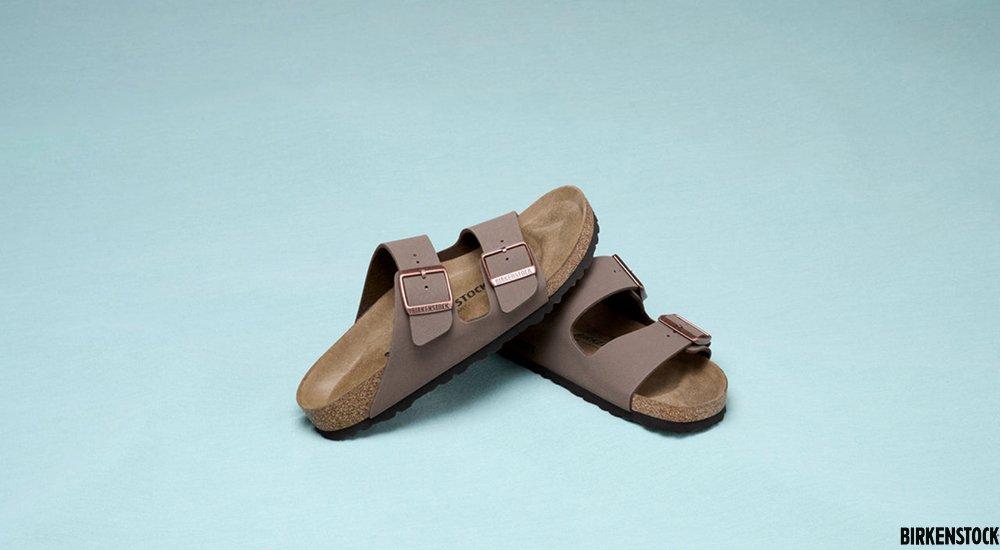 Pair of Birkenstocks on a blue background 