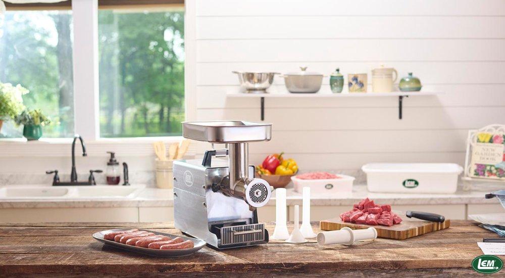 meat grinder and tools on a table