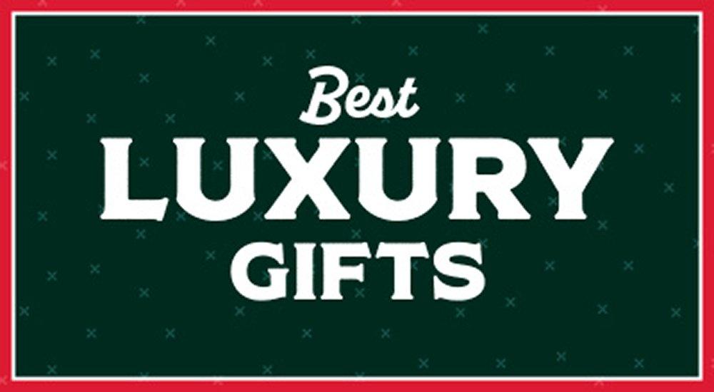 woman wearing a Garmin watch on stairs while holding a coffee