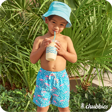 Chubbies lifestyle image of a boy wearing swimsuit