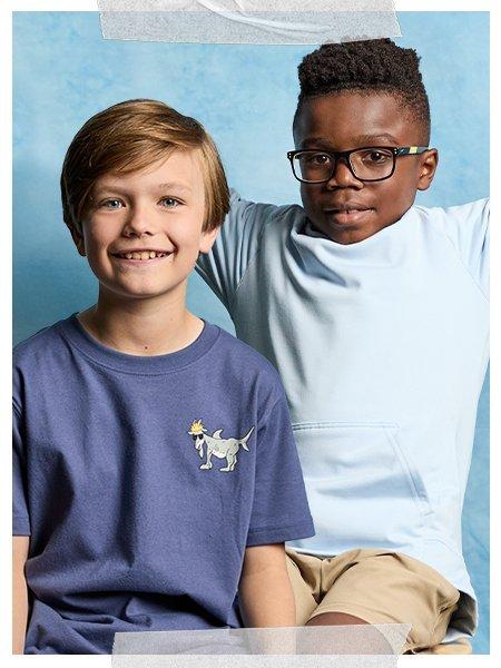 2 boys smiling for a picture