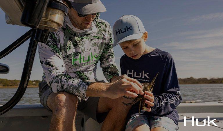 Kid Fishing Wearing Huk Gear