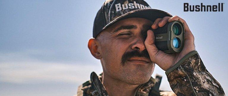 Lifestyle image of man using Bushnell optic