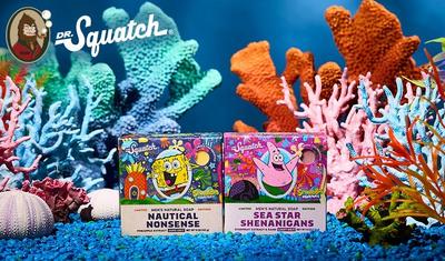 Dr. Squatch Bar soap sitting on a tree trunk