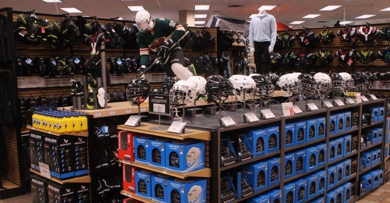helmets and other hockey gear displayed