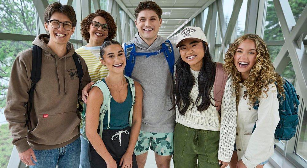 group of college students with school gear