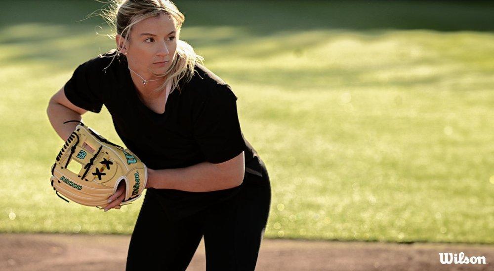 softball player on the field with a softball glove