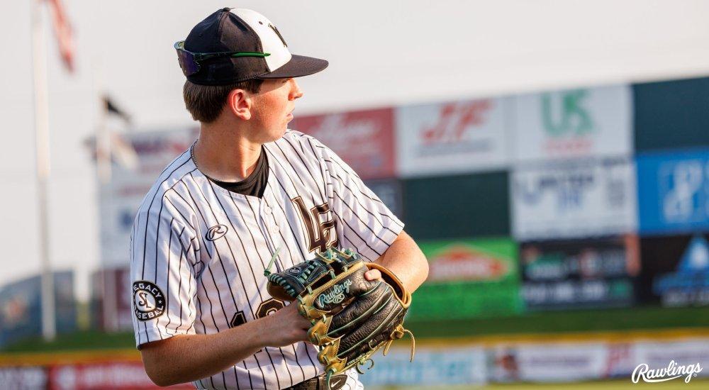 baseball player with baseball glove preparing to throw