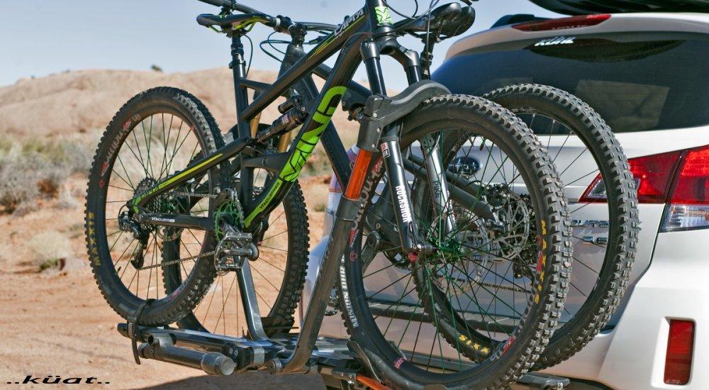 bikes racked on trunk of car