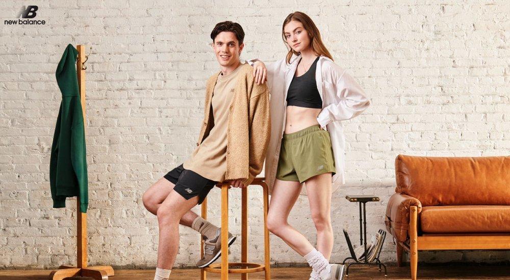 A man and woman wearing athleisure outfits
