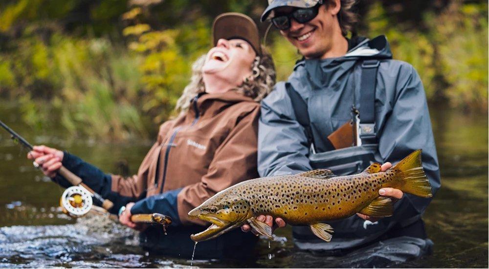 a mother and son duo fishing together