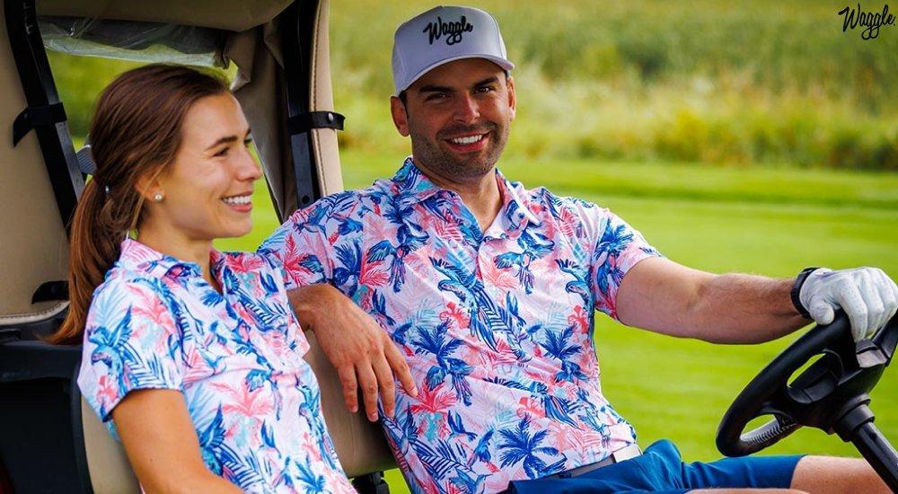two people smiling, sitting in a golf cart 