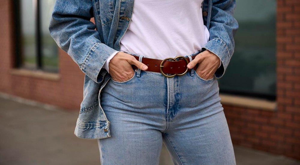 A woman in jeans and a denim jacket