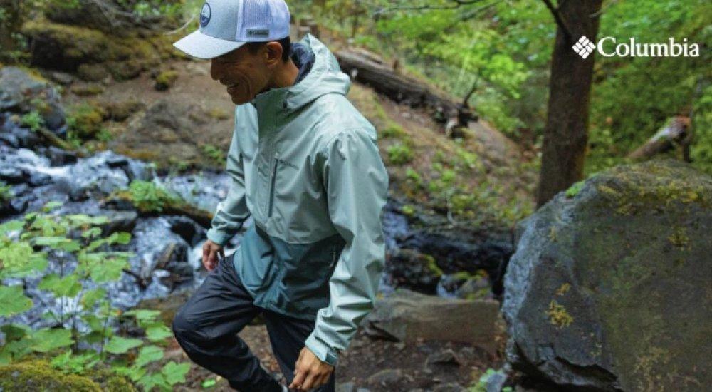 a man hiking in a water repellent jacket 