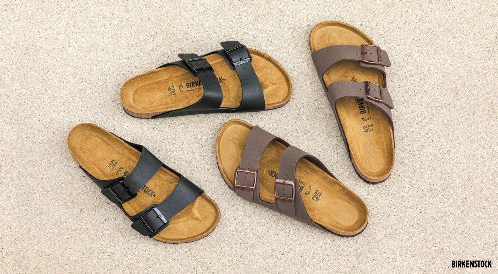Two pairs of BIRKENSTOCK Arizona sandals