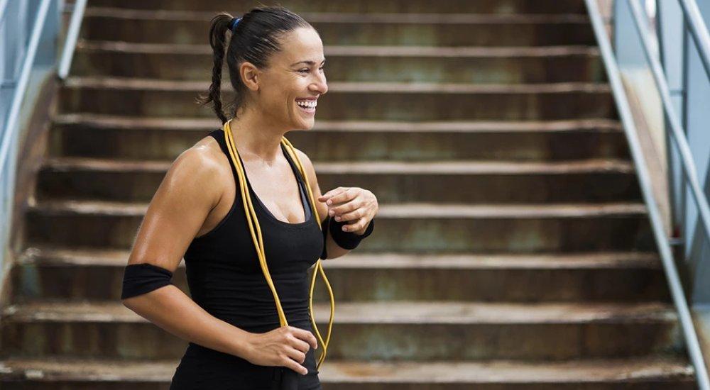 a woman with a jump rope around her